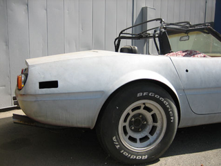 Illustration for article titled We Won't Even Give You Eight Bucks: Ferrari Daytona?